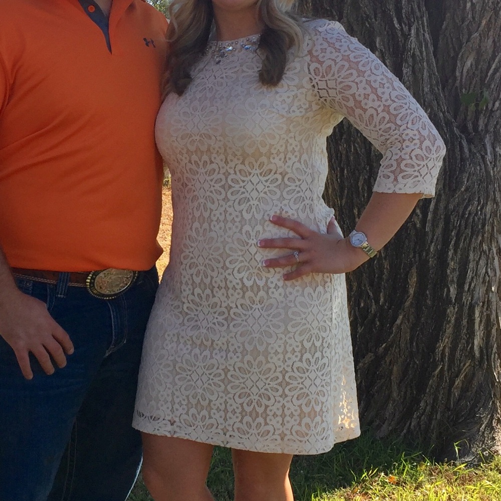 Short cream lace dress with beaded neckline